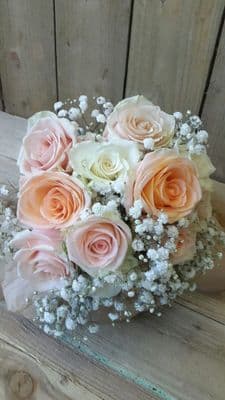Brides Hand Tied  Peach and Cream Roses with gyp