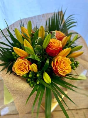 Lily and Rose Vase arrangement includes Chocolates