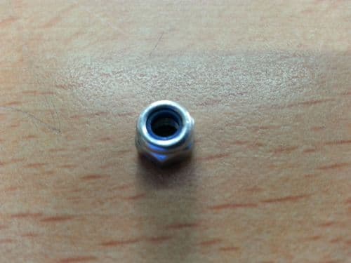 04826400 Countax NUT, M4 NYLOC A107