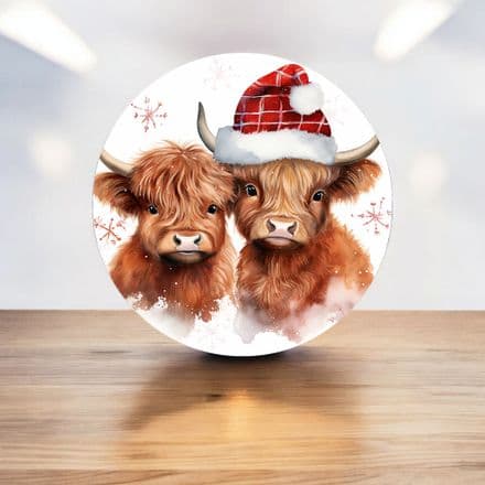 Highland cows in the snow wearing a santa hats circle - Metal Street Sign Wall Sign