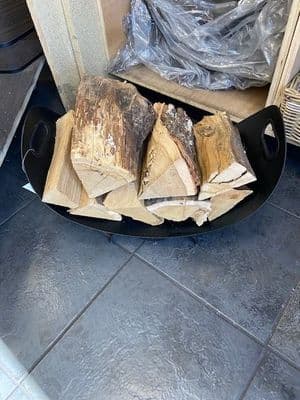 Curved black log holder