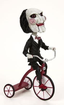 SAW BILLY THE PUPPET ON TRICYCLE HEADKNOCKER