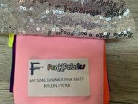 High front leotard with keyhole back and sequin skirt on silver waistband