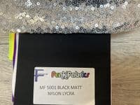 High front leotard with keyhole back and sequin skirt on silver waistband