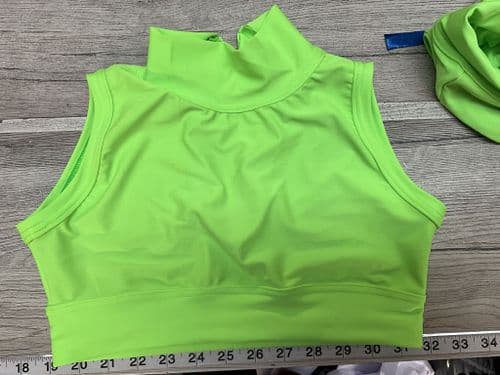 High neck crop. Flo green. Front lined. Age 12-13