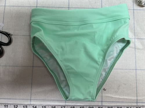 Knicks. Mint Green Fully lined. Age 7-8 x