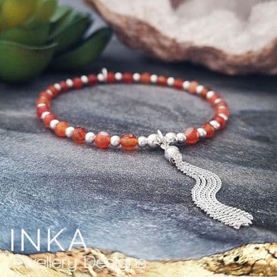 INKA Bright Orange Carnelian Tassel Bracelet.