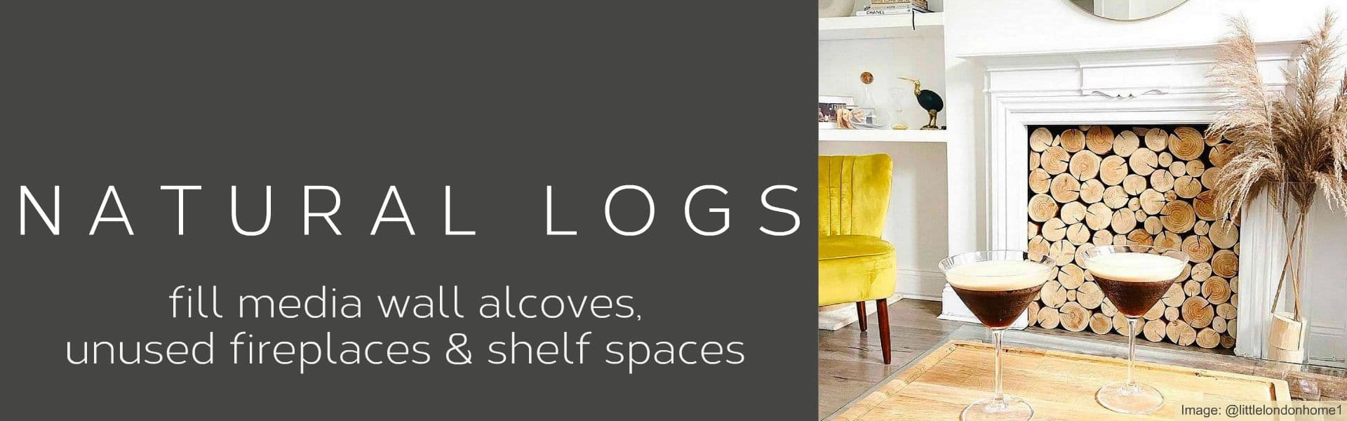 Decorative logs from The Log Basket fill a large unused period fireplace