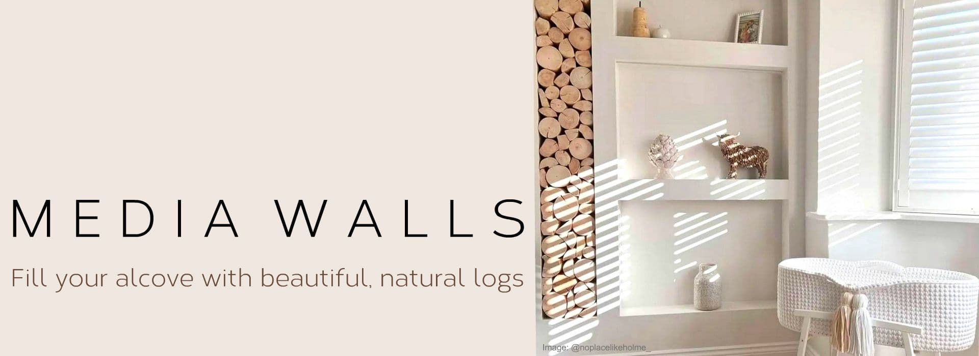 Decorative logs from The Log Basket fill media wall alcoves