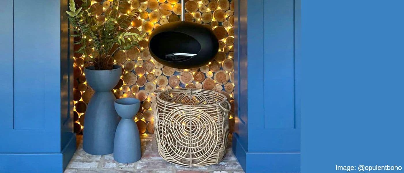 Log Wall Tiles from The Log Basket create a stunning backdrop behind a bioethanol fire via @opulentboho
