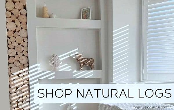Neat clean natural wood decorative logs for media wall alcoves and unused fireplace recesses from The Log Basket