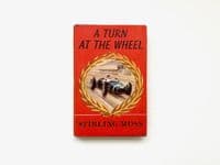 A Turn At the Wheel Signed by Stirling Moss First Edition William Kimber 1961