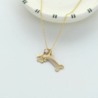 Dog Paw And Bone Charm Necklace
