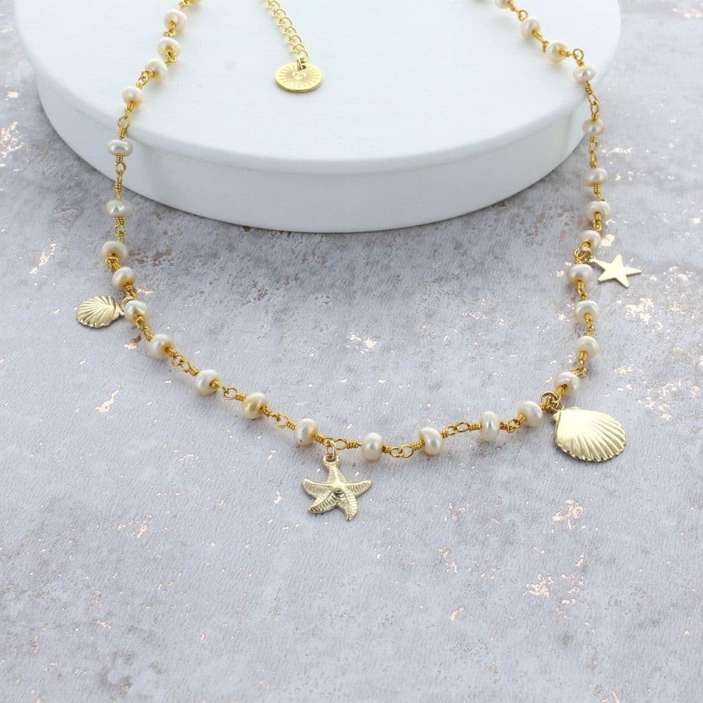 Pearl Necklace With Corded Shell And Pearl Tassel main image 0