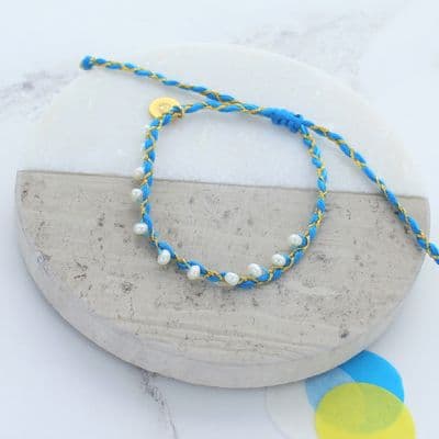Woven blue pearl friendship bracelet