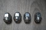 4 GENUINE DAEWOO / CHEVROLET KALOS CHROME DOMED WHEEL NUTS