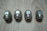 4  GENUINE  KIA PICANTO  CHROME DOMED WHEEL NUTS