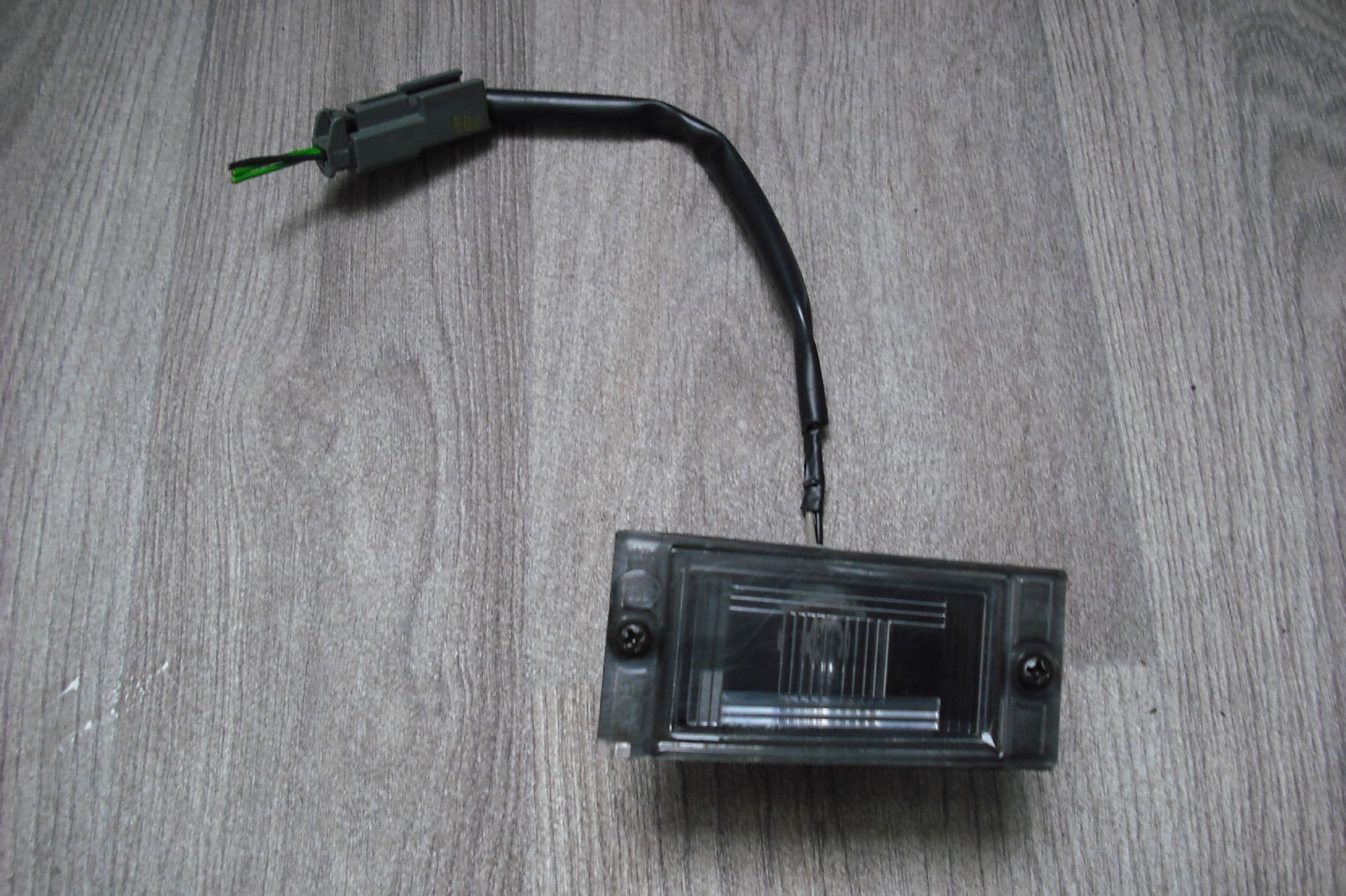 A GENUINE KIA SPORTAGE REAR NUMBER PLATE LICENCE PLATE LIGHT