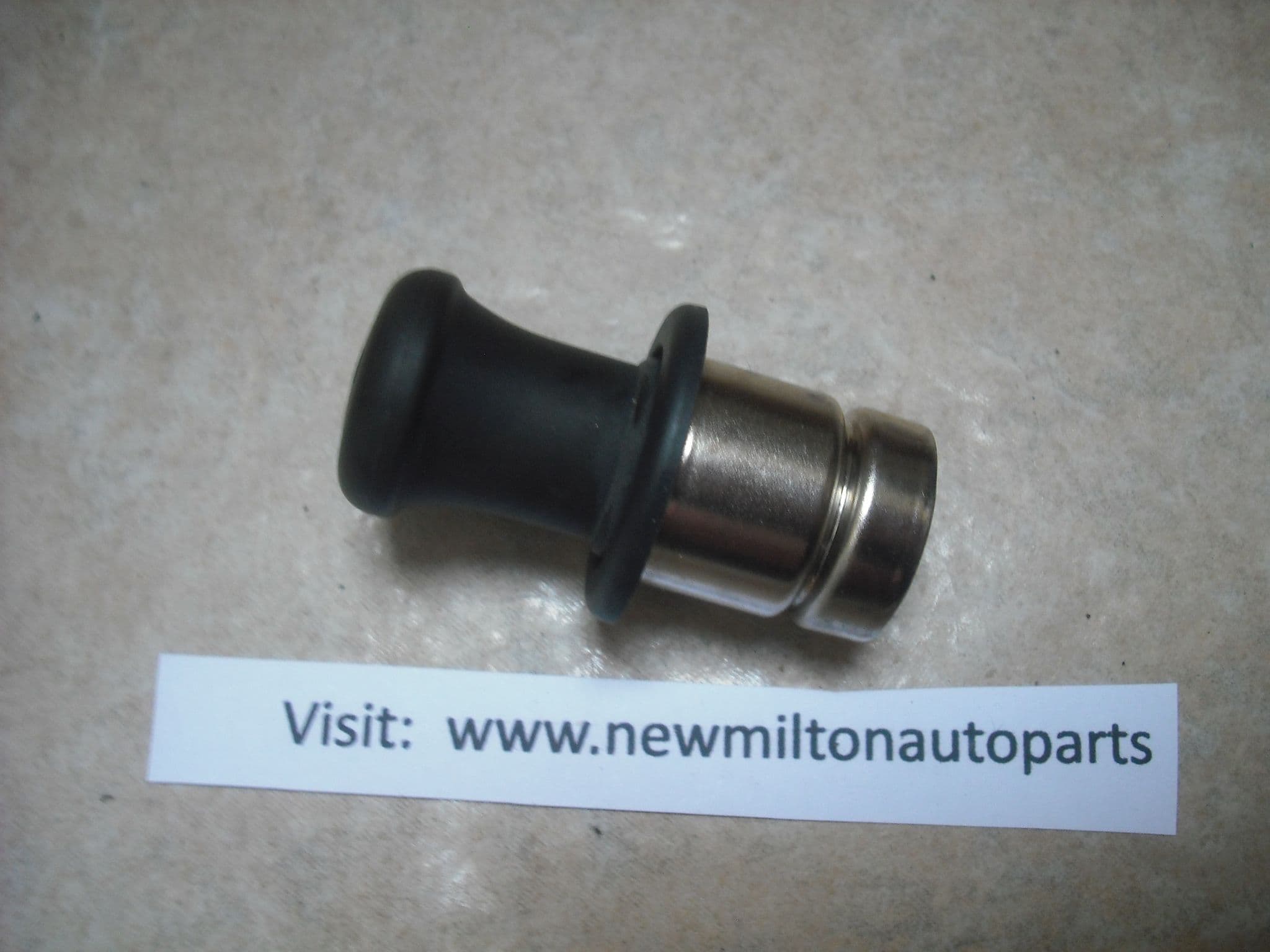 A GENUINE MAZDA 3 2003-2008 CIGARETTE LIGHTER INSERT
