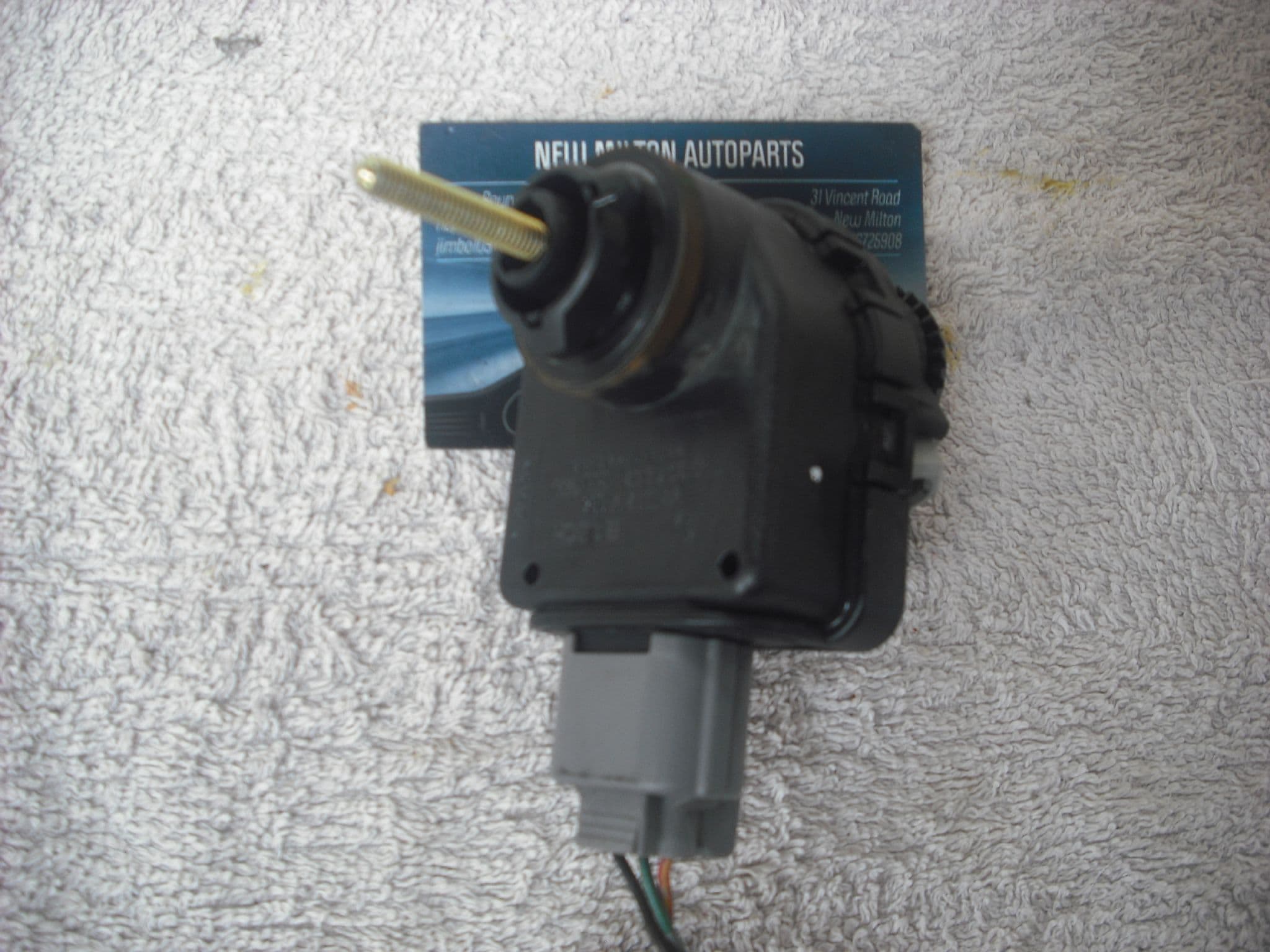 A GENUINE MAZDA MPV HEADLIGHT HEADLAMP HEIGHT LEVEL ADJUSTMENT MOTOR