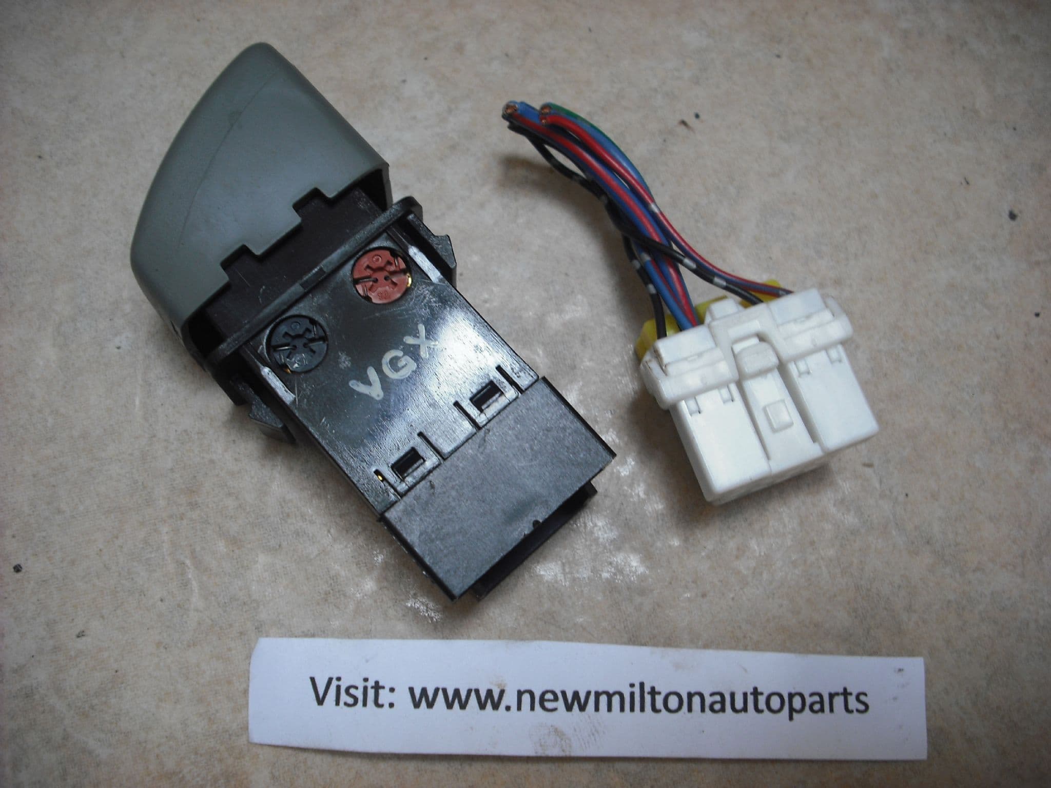 A GENUINE NISSAN MICRA K11 HEATED REAR WINDOW DEMISTER SWITCH