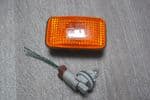 A GENUINE NISSAN X-TRAIL AMBER SIDE WING MARKER INDICATOR FLASHER