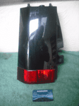 A GENUINE VAUXHALL MERIVA 2002-2007 REAR BACK LIGHT LAMP LOWER TRIM PANEL BLACK  N/S LH LEFT SIDE