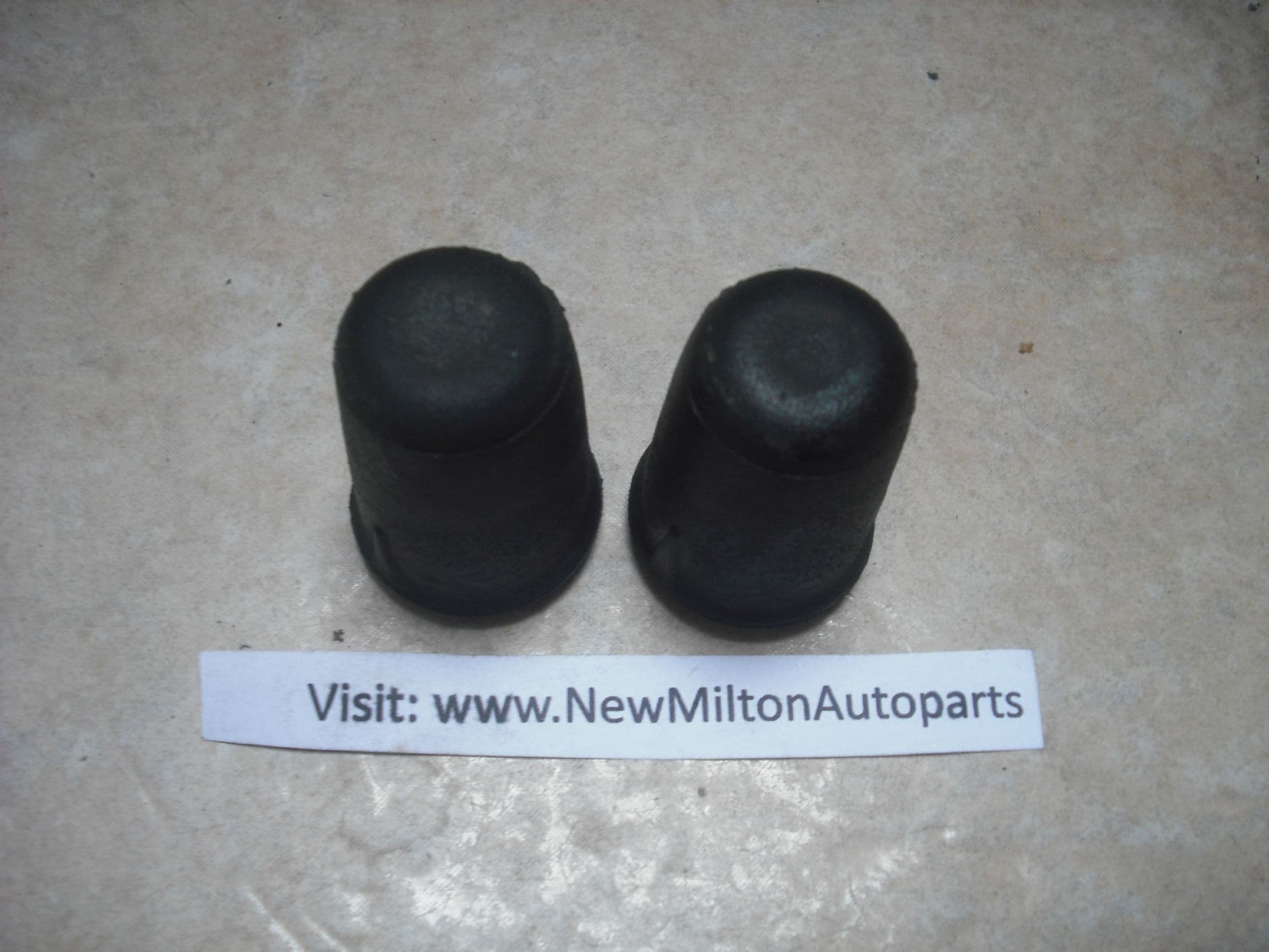 A PAIR OF GENUINE FORD FIESTA MK7 BONNET HOOD RUBBER BUMP STOPS