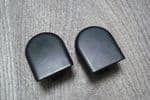 A PAIR OF MITSUBISHI COLT FRONT WINDOW  WIPER ARM FIXING NUT COVERS