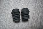 A PAIR OF VAUXHALL CORSA D & E   RUBBER BONNET BUMP STOPS
