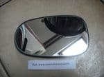SOLD        3001-610   A GENUINE  NISSAN ALMERA N16  DOOR MIRROR GLASS  LEFT SIDE  N/S