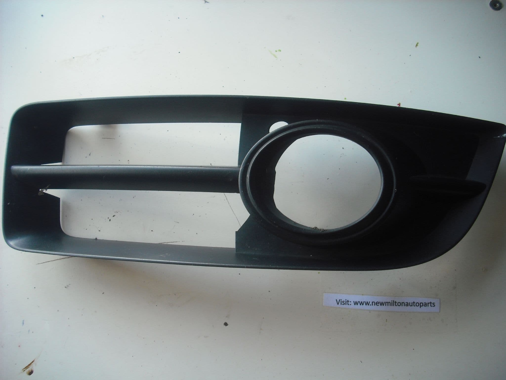 thumbnail image 2 of Evan-Fischer Left Front Fog Light Trim For 2008-2010 Chrysler Town & Country (Primed, Direct Fit) 2 of 4