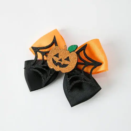 Halloween: A Pair Of Pumpkin Smiley Bow Hair Clips