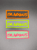 Embroidered Iron on Neon Pink Im Anxious Badge for Dogs by Lazy Dog Company.