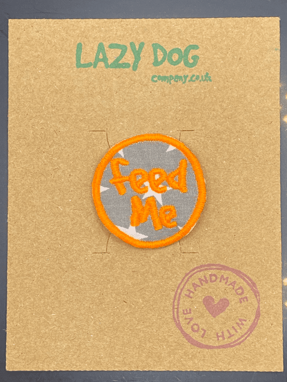 Embroidered Iron on Orange Feed Me Badge for Dogs by Lazy Dog Company