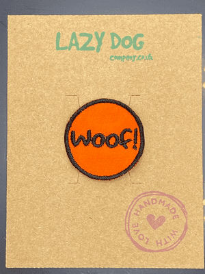 Embroidered Iron on Orange Woof! Badge for Dogs by Lazy Dog Company.