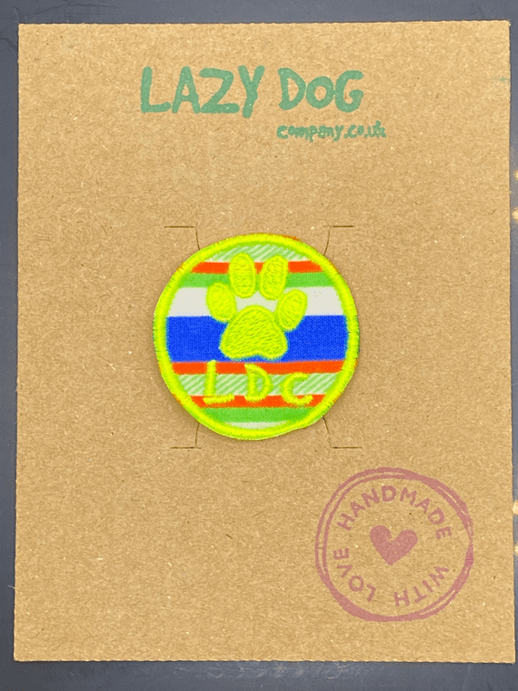 Embroidered Iron on Yellow LDC Paw Print Badge for Dogs by Lazy Dog Company