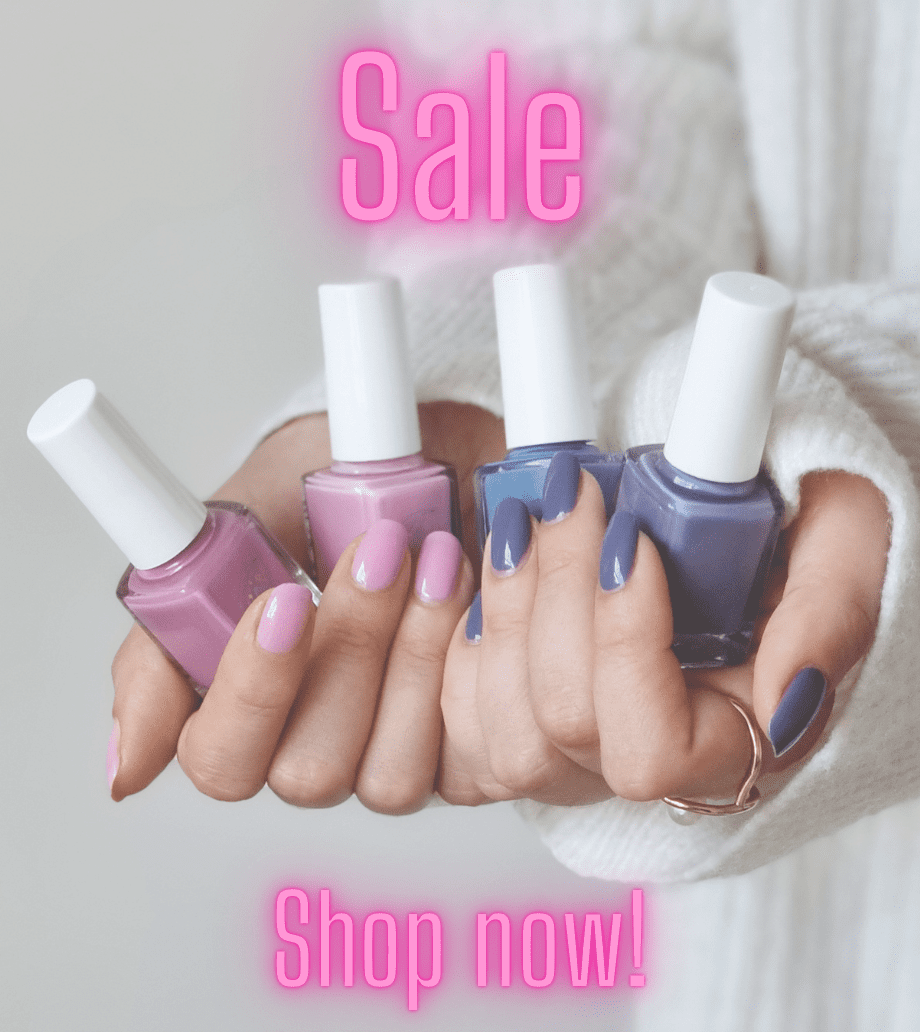 Two hand wearing indie nail polish holds bottles of indie nail polish