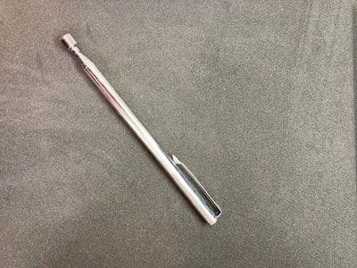 Telescopic magnetic pick up tool