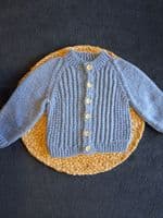 Babies Round Neck Twist Cardigan Knitting Pattern | Family Business Established 1949 | Knitwell Wools