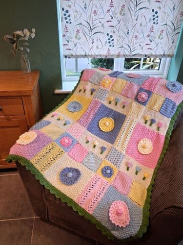 WC3022 Springtime Blooms Blanket Knitting Pattern