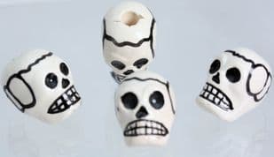 GLAZED SKULL -hole top to bottom from 0.42p