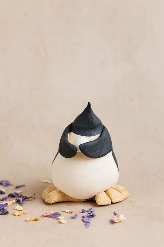 Louise O'Connor Ceramics | Penguin with Snowball Sculpture | Ceramic Penguin | England