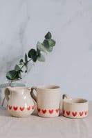 Thomas Powell Pottery | Handmade Ceramic Coffee Cup with Heart Design