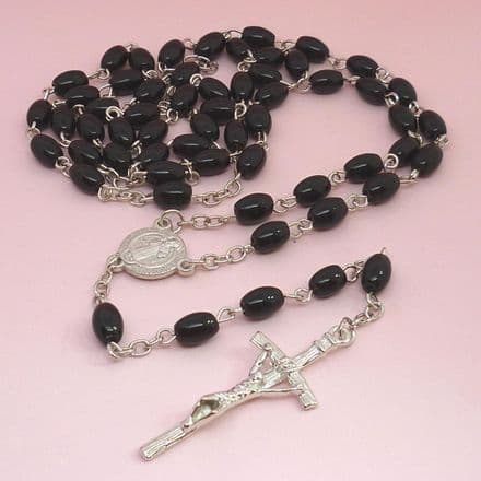 Black Oval Bead Rosary with a Saint Benedict Centrepiece
