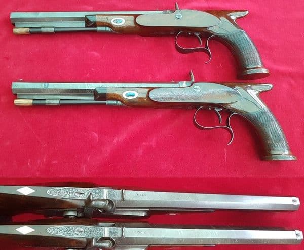 *A cased pair of saw-handled Percussion Duelling pistols by COLE super condition. FOR SALE. Ref 1674