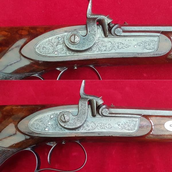 *A cased pair of saw-handled Percussion Duelling pistols by COLE super condition. FOR SALE. Ref 1674