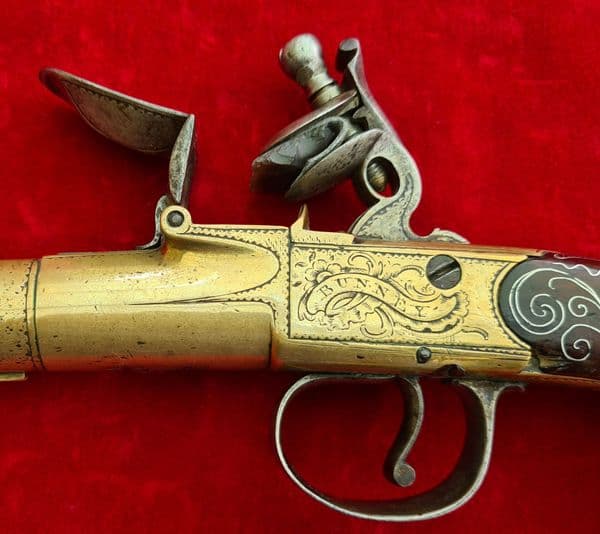 A brass framed flintlock cannon barrel pistol by Bunney London C. 1780. Ref 2397
