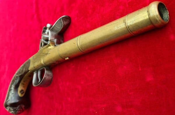 A brass framed flintlock cannon barrel pistol by Bunney London C. 1780. Ref 2397