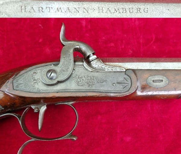 A fine pair of German .58 calibre  percussion target pistols by Hartmann Hamburg. C. 1840. Ref 4334.